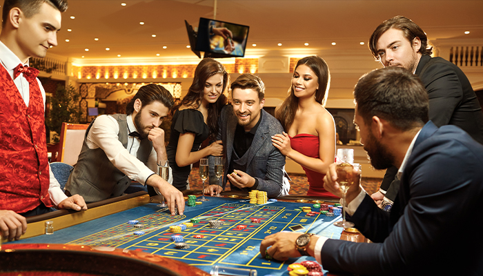 Gamblers playing on a European roulette table.