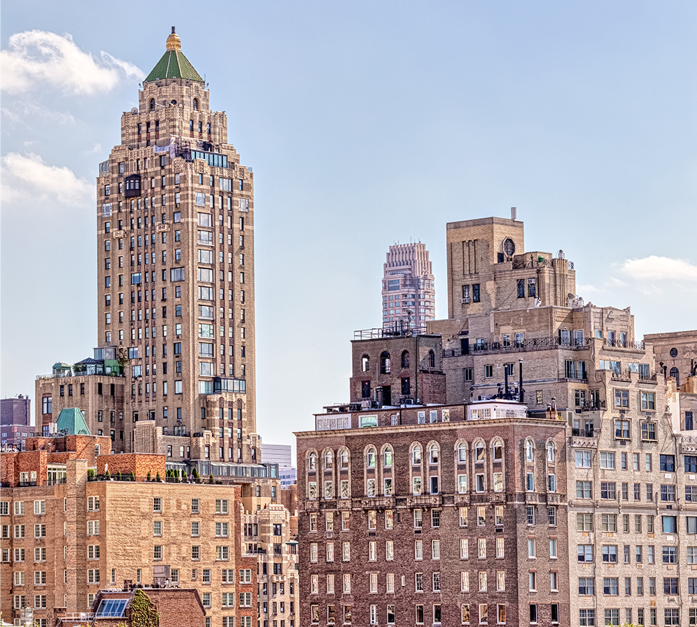 The Carlyle building with a blue sky background in New York City which is the inspiration for the movie, Tar.