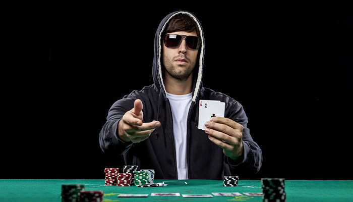 Player Sat at Poker Table