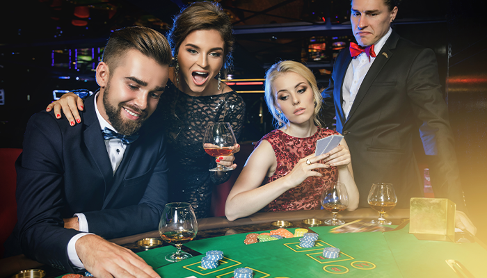 Poker Players Sat Around Table