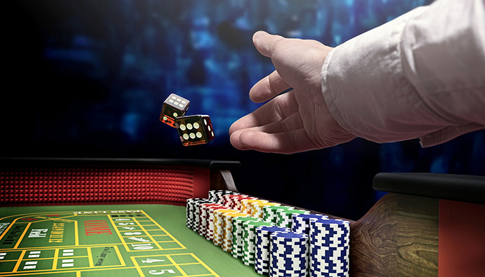 Gambler Playing Craps in a Casino