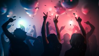 Partygoers Dancing in Casino Nightclub