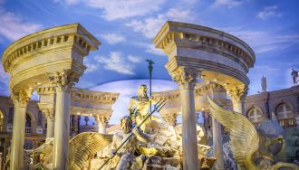 Caesars Entertainment Casino Gateway With Statues of Greek Gods
