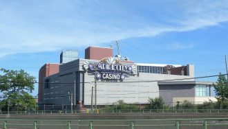 Empire City Casino against a blue sky background