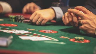 Men playing poker in a casino