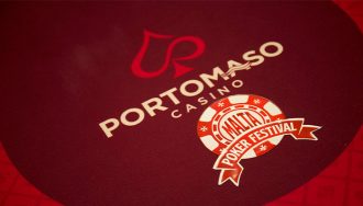 Portomaso Casino Malta Poker Festival Logo on a Red Poker Table
