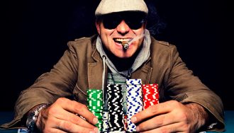Kansas Casino Poker Player Smoking a Cigar