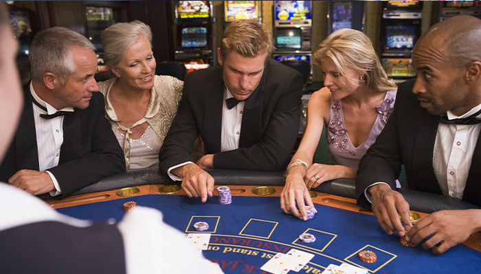 Gamblers Playing Blackjack in Casino
