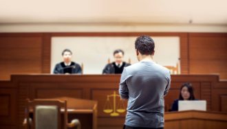 Defendant in Courtroom