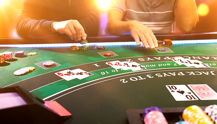 Gamblers Playing Blackjack in a Casino