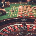 Gamblers at Roulette Table