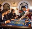 Gamblers at Roulette Table in Casino