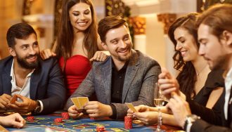 Gamblers Playing Blackjack in Casino