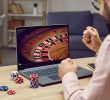 Gambler Playing Online Roulette